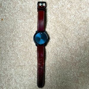 Movado bold face watch. 395 value